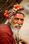 Old man with flowered hat