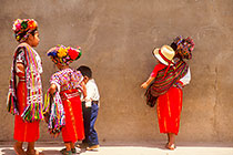 Indian girls in front of wall