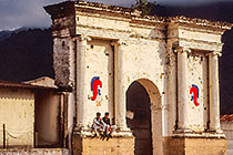 Men sitting on old church frontage