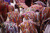 Indian women in procession with huepil on head & candles
