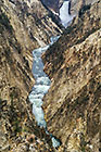 Yellowstone river canyon & waterfall with sulphur slopes