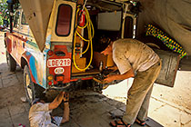 Paul & Adrien repairing landy, tank & exhaust pipe