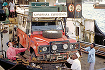 Paul + crane loading landy on ship to Zanzibar