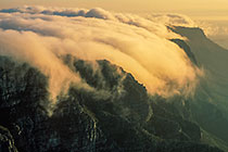 clouds diving down 12 Apostles mts at sunset