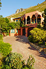 Cocagne house : driveway + garage + house + mountain