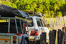 Land Cruiser with trailer crossing bridge