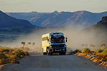 truck on road with mountains