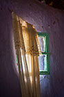 hut window with curtains