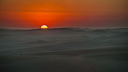 sunrise over sand dunes