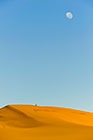 full moon over sand dune