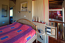 Cocagne house : master bedroom with alarm control