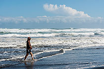 Leon walking on volcanic beach