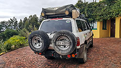 land cruiser | rear view with 2 spare wheels & 200 watt solar panel under tent (options)