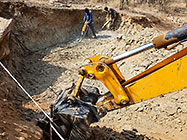 Donald & Sedney braking rocks & digger loader excavating foundations for workshop & studio