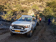 ranger with trailer with 10000 l water tank driving up hill