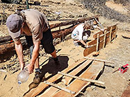 Anne & Paul building Hugel garden boxes with prosopis plancks