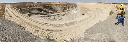Monika Shipanga & driver inspecting mine pit