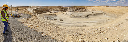 Monika Shipanga & driver inspecting mine pit