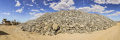 graded mined rocks containing gold ore ready to be crushed