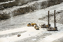 drilling machines & water truck in pit