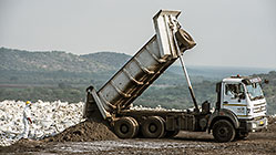 arsenic waste site | truck offloading arsenic waste