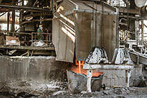 smelting of copper ore into bucket