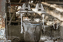 smelting of copper ore into bucket