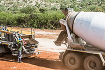 concrete truck & pump for top of thick plastic lining in new water bassin