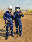 arsenic waste site | Paul & site manager in full PPE