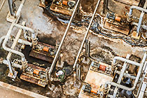 worker checking Ion Exchange (IX) pumps