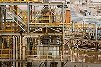 worker cleaning Counter Current Decantation (CCD) tower