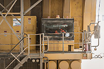 driver in 320T truck in workshop