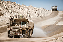 water truck & 320 T truck driving on road
