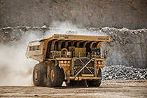 320 T truck driving in pit