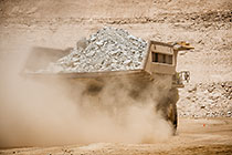320 T truck driving in pit