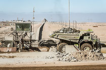 320 T truck off loading at crusher