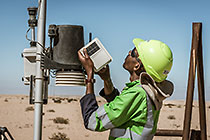 environmental monitoring assistant Immanual checking weather station