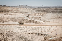 320 T truck driving near area ready for blasting