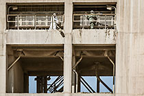 workers cleaning inside tower