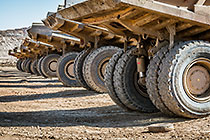 trucks parked during blasting operation