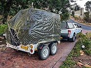 ranger with trailer fully loaded in drieway