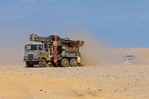 drilling rig in arid plain