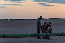 SkyTEM team checking rig before take-off