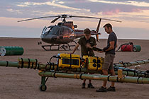 SkyTEM team checking rig before take-off