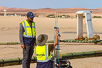 SkyTEM team checking rig before take-off