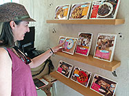 Lisa looking at postcards