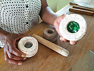 lady explaing bead making