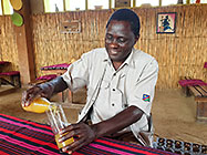 Elias pouring juice
