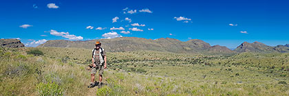 Paul hiking on Olive trail through mountains