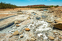hot spring deposit in river